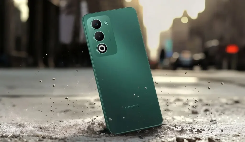 OPPO A5 in green color dropped on concrete with urban background